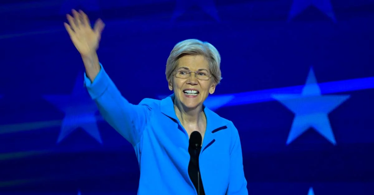 Elizabeth Warren waving to a crowd.